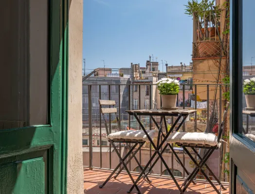 View of Barcelona rooftops from an apartment balcony