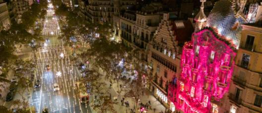 Aerial view of Passeig de Gràcia with Christmas lights decorating the street and the Casa Batlló illuminated